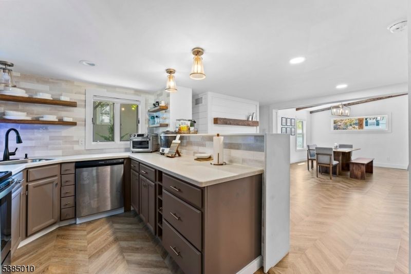Dining room, Interior, Kitchen, Pendant Lights, Recessed Lighting, Stainless Steel Appliances, Wood Texture Flooring