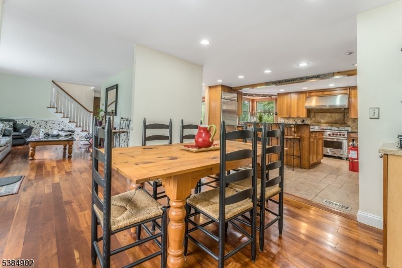 Dining room, Interior, Kitchen, Recessed Lighting, Stainless Steel Appliances, Wood Texture Flooring