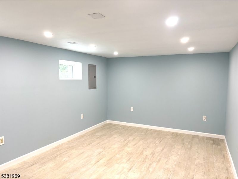 Elevator, Empty room, Interior, Recessed Lighting, Wood Texture Flooring