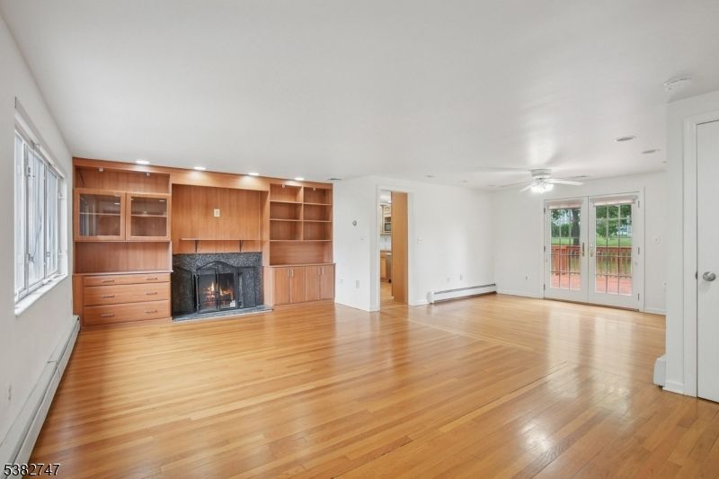 Empty room, Fireplace, Interior, Recessed Lighting, Wood Texture Flooring