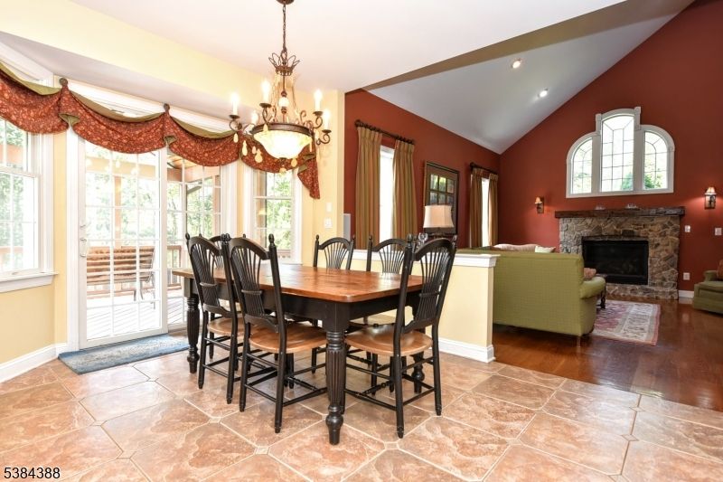 Chandelier, Dining room, Fireplace, Interior, Living room, Recessed Lighting, Wood Texture Flooring