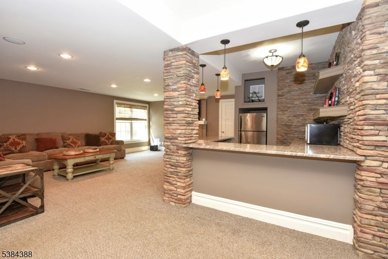 Interior, Living room, Pendant Lights, Recessed Lighting, Stone Walls