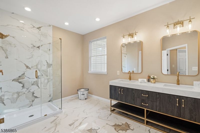 Bathroom, Dual Sink Vanities, Glass Shower, Interior, Marble, Marble Walls, Recessed Lighting