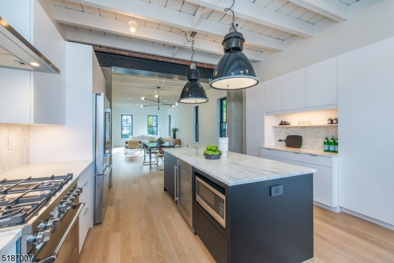 Dining room, Interior, Kitchen, Pendant Lights, Stainless Steel Appliances, Wood Texture Flooring