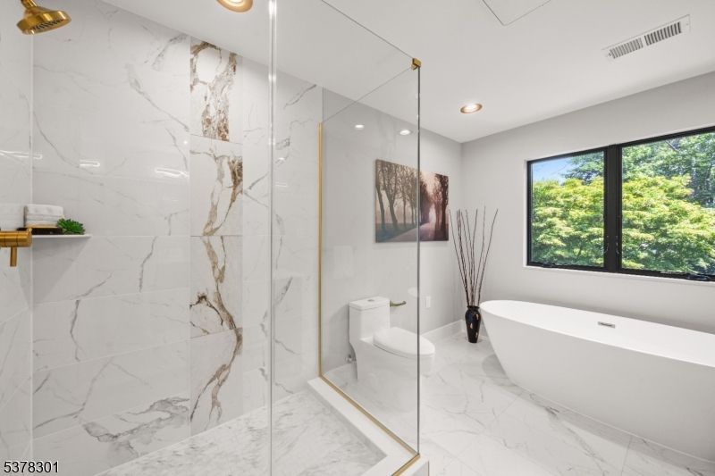 Bathroom, Free Standing Baths, Glass Shower, Interior, Marble, Marble Walls, Recessed Lighting