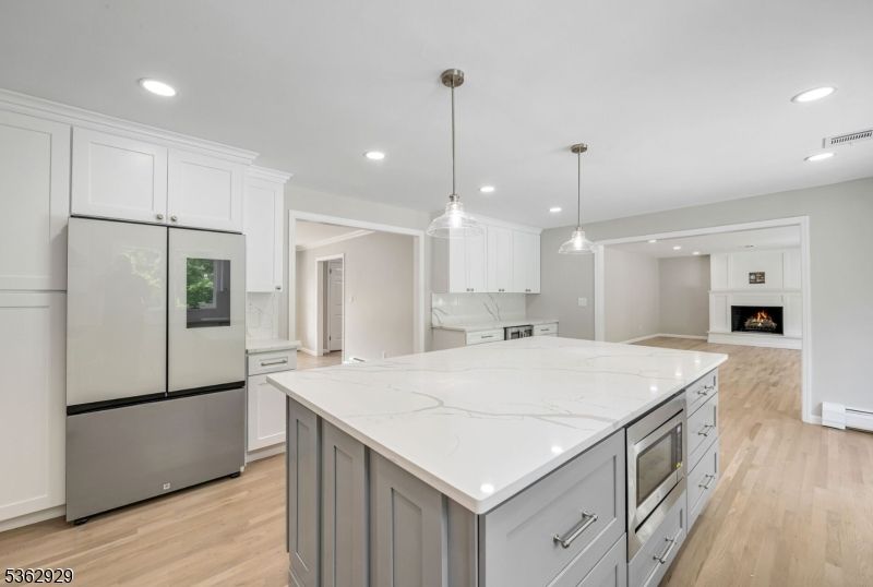 Fireplace, Interior, Kitchen, Pendant Lights, Recessed Lighting, Stainless Steel Appliances, Wood Texture Flooring