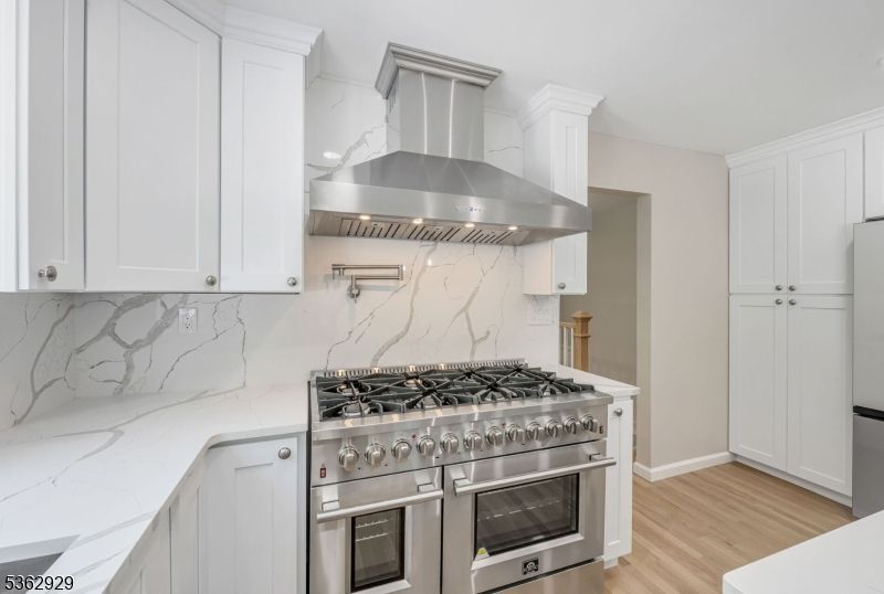 Interior, Kitchen, Marble Walls, Stainless Steel Appliances, Wood Texture Flooring