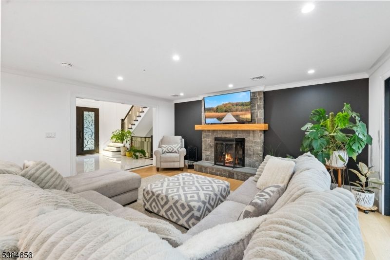Fireplace, Interior, Living room, Recessed Lighting, Wood Texture Flooring