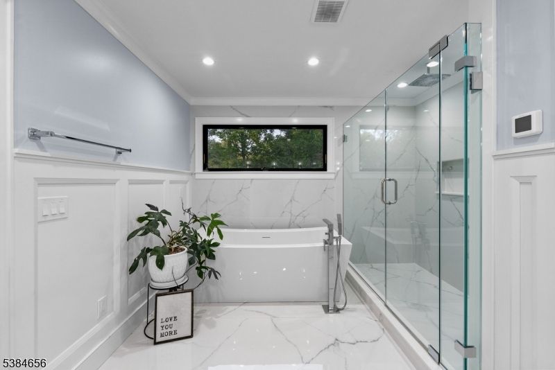 Bathroom, Free Standing Baths, Glass Shower, Interior, Marble, Marble Walls, Recessed Lighting
