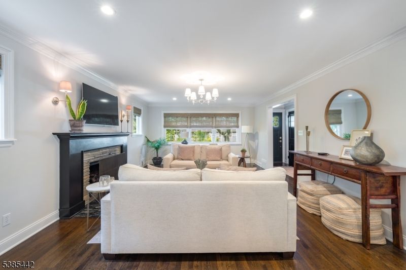 Chandelier, Fireplace, Interior, Living room, Recessed Lighting, Wood Texture Flooring