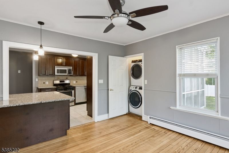 Interior, Kitchen, Pendant Lights, Stainless Steel Appliances, Washer, Wood Texture Flooring