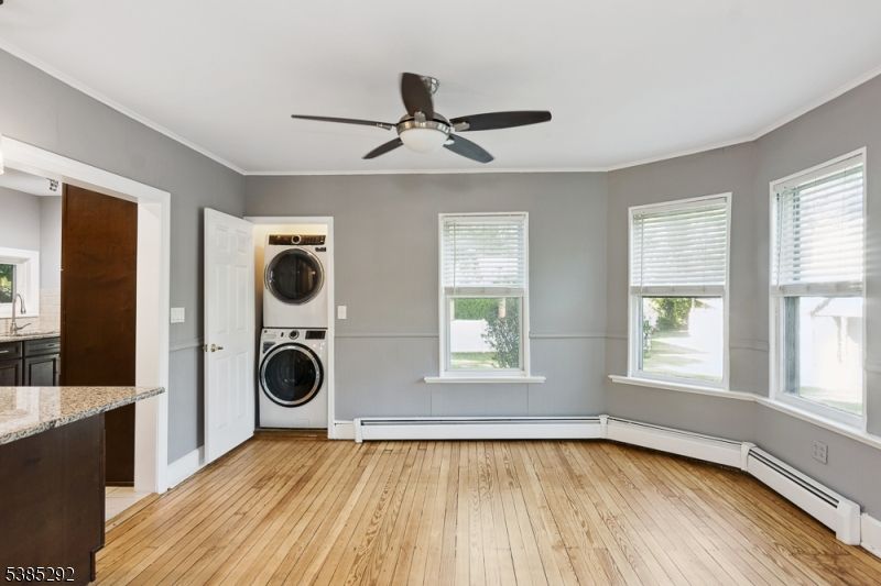 Empty room, Interior, Utility Closets, Washer, Wood Texture Flooring
