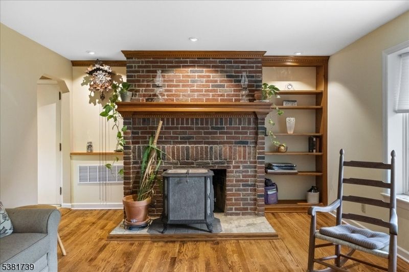Fireplace, Interior, Recessed Lighting, Stone Walls, Wood Texture Flooring