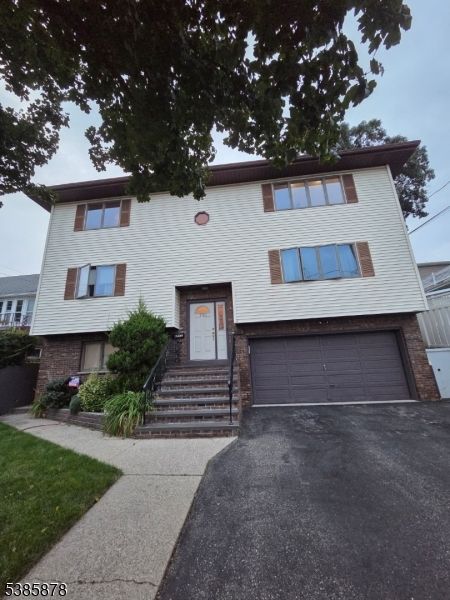 Attached, Exterior, Facade, Raised Ranch