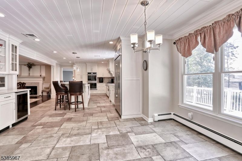 Dining room, Fireplace, Interior, Kitchen, Pendant Lights, Recessed Lighting, Stainless Steel Appliances