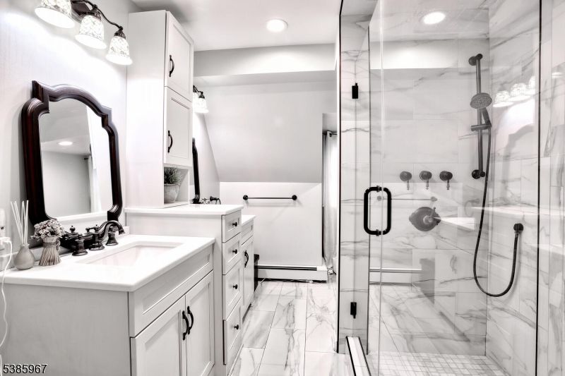 Bathroom, Dual Sink Vanities, Glass Shower, Interior, Marble, Marble Walls, Recessed Lighting