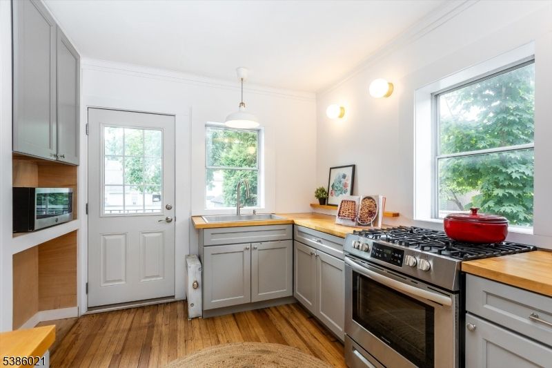 Interior, Kitchen, Pendant Lights, Stainless Steel Appliances, Wood Texture Flooring