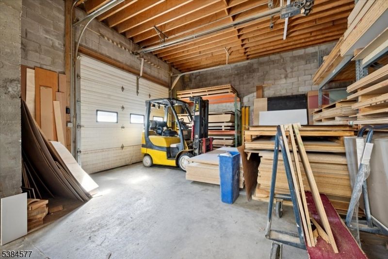 Garage, Interior, Stone Walls, Wooden Beams