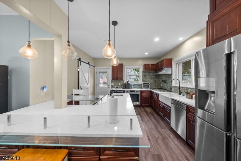 Interior, Kitchen, Pendant Lights, Recessed Lighting, Stainless Steel Appliances, Wood Texture Flooring