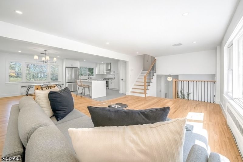 Dining room, Interior, Kitchen, Living room, Pendant Lights, Recessed Lighting, Stainless Steel Appliances, Wood Texture Flooring