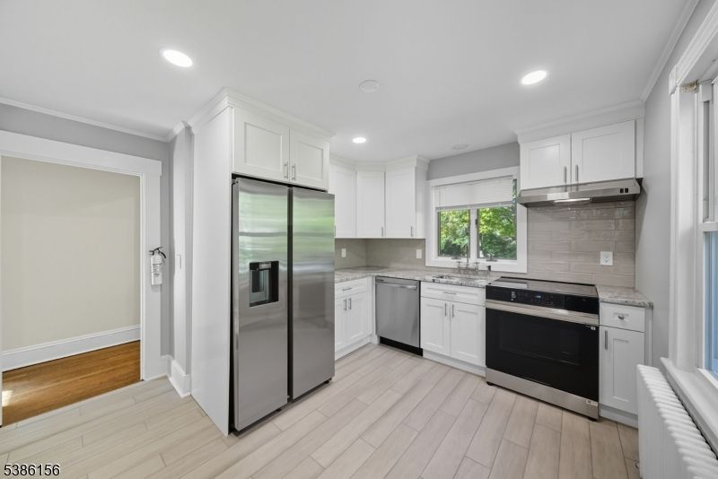 Interior, Kitchen, Recessed Lighting, Stainless Steel Appliances, Wood Texture Flooring