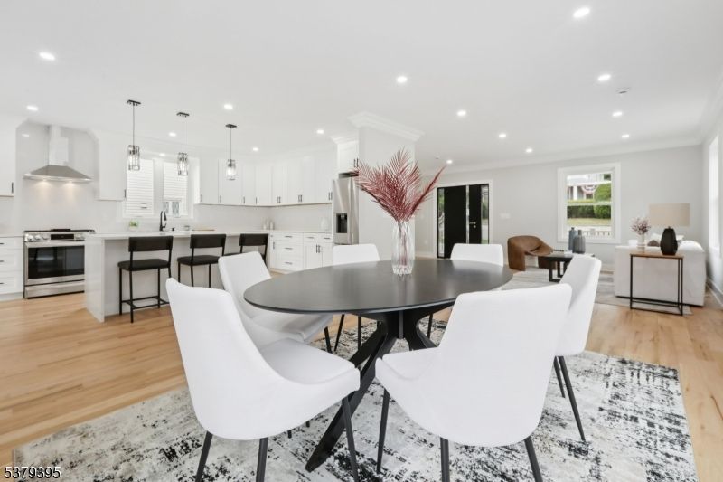 Dining room, Interior, Kitchen, Pendant Lights, Recessed Lighting, Stainless Steel Appliances, Wood Texture Flooring