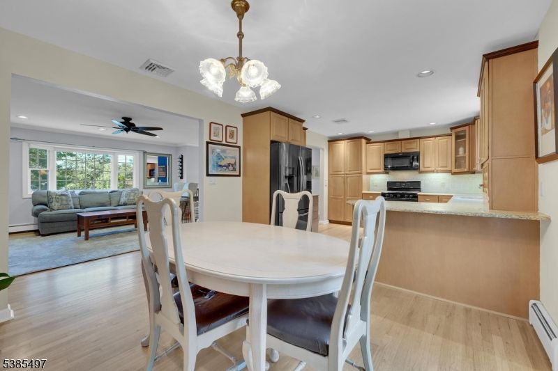 Dining room, Interior, Kitchen, Living room, Pendant Lights, Recessed Lighting, Stainless Steel Appliances, Wood Texture Flooring