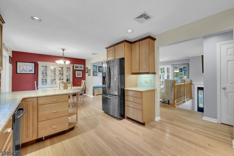 Chandelier, Dining room, Fireplace, Interior, Kitchen, Recessed Lighting, Wood Texture Flooring