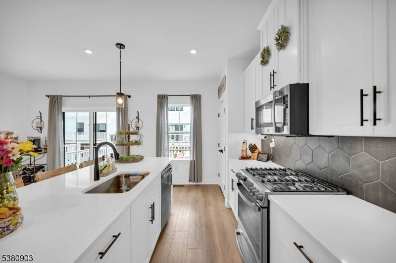 Interior, Kitchen, Pendant Lights, Recessed Lighting, Stainless Steel Appliances, Wood Texture Flooring