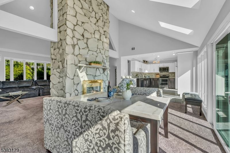 Dining room, Fireplace, Interior, Kitchen, Living room, Pendant Lights, Recessed Lighting, Stainless Steel Appliances, Stone Walls