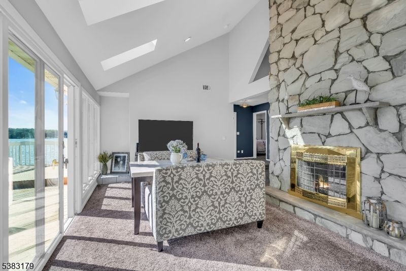 Fireplace, Home Office, Interior, Recessed Lighting, Stone Walls, Water