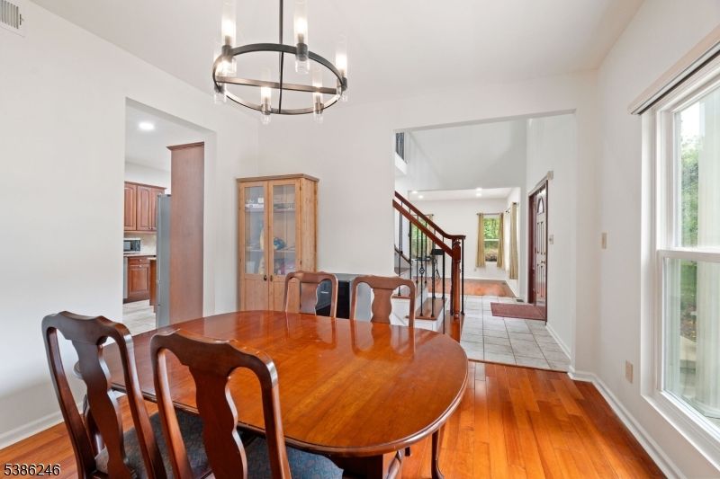Chandelier, Dining room, Interior, Pendant Lights, Recessed Lighting, Wood Texture Flooring