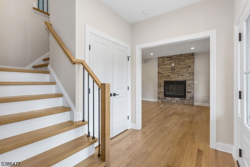 Fireplace, Interior, Recessed Lighting, Stone Walls, Wood Texture Flooring