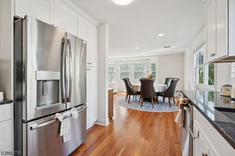 Dining room, Interior, Kitchen, Recessed Lighting, Stainless Steel Appliances, Wood Texture Flooring