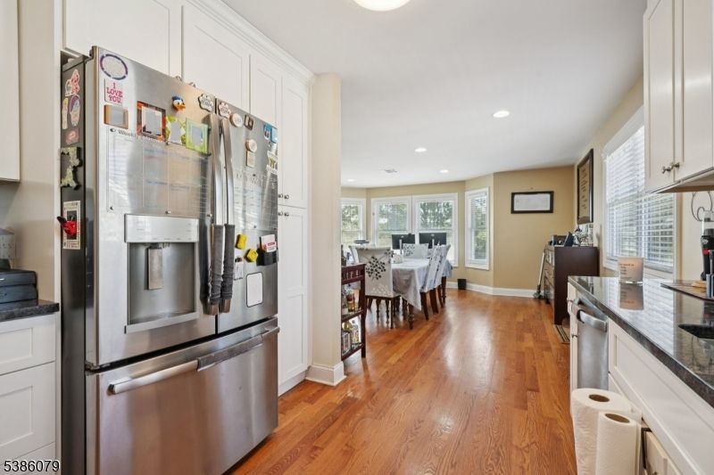 Dining room, Interior, Kitchen, Recessed Lighting, Stainless Steel Appliances, Wood Texture Flooring