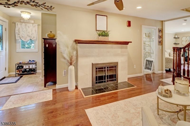 Chandelier, Fireplace, Interior, Recessed Lighting, Wood Texture Flooring