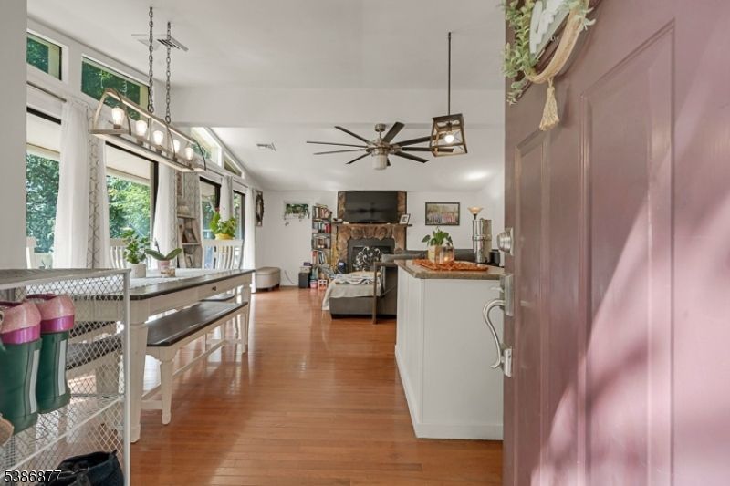 Dining room, Fireplace, Interior, Living room, Pendant Lights, Wood Texture Flooring
