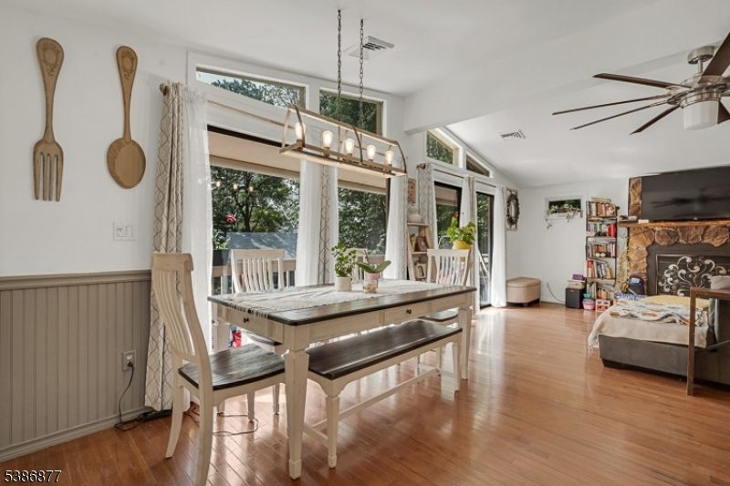 Dining room, Fireplace, Interior, Pendant Lights, Wood Texture Flooring