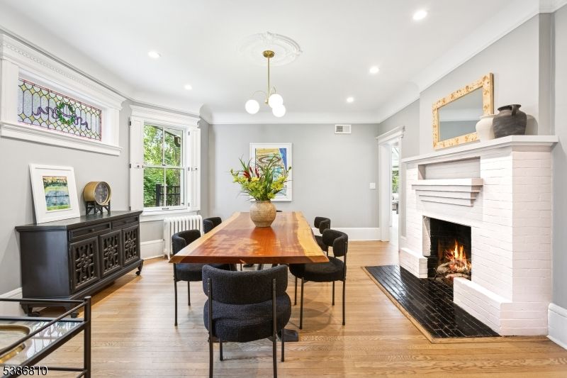 Dining room, Fireplace, Interior, Pendant Lights, Recessed Lighting, Wood Texture Flooring