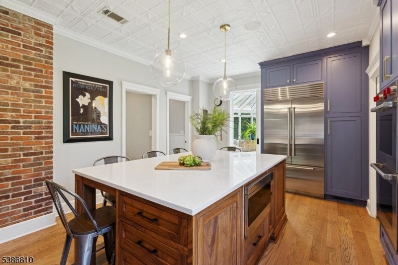 Interior, Kitchen, Pendant Lights, Recessed Lighting, Stainless Steel Appliances, Stone Walls, Wood Texture Flooring