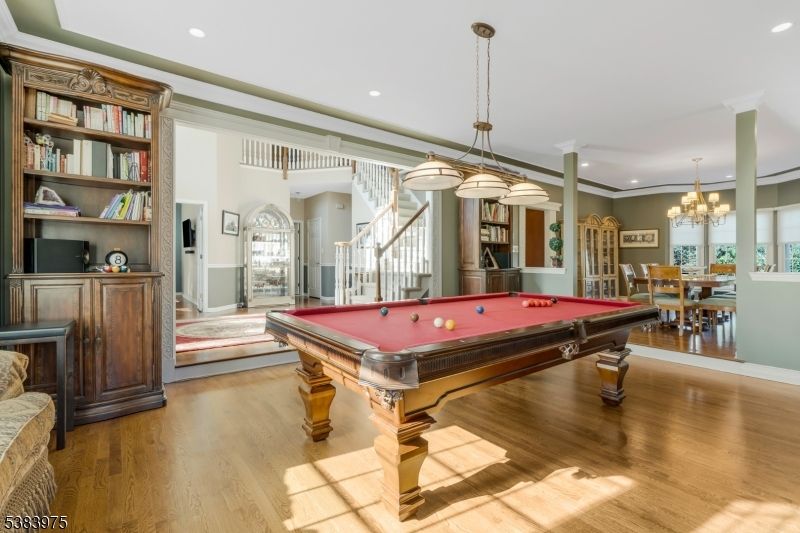 Billiard Table, Chandelier, Dining room, Game Room, Interior, Pendant Lights, Recessed Lighting, Wood Texture Flooring