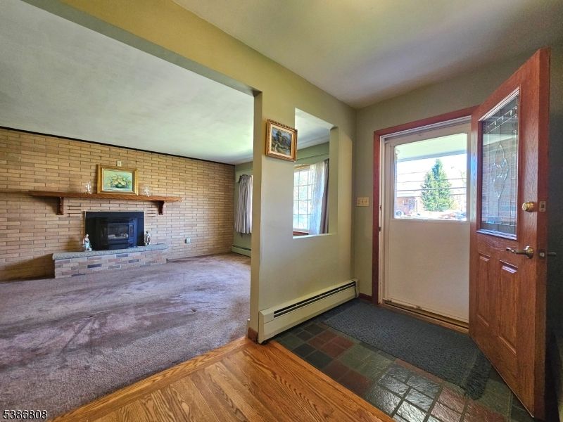 Empty room, Fireplace, Interior, Stone Walls, Wood Texture Flooring