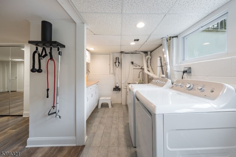 Bathroom, Interior, Recessed Lighting, Washer, Wood Texture Flooring