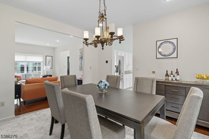 Chandelier, Dining room, Interior, Kitchen, Living room, Recessed Lighting, Stainless Steel Appliances, Wood Texture Flooring