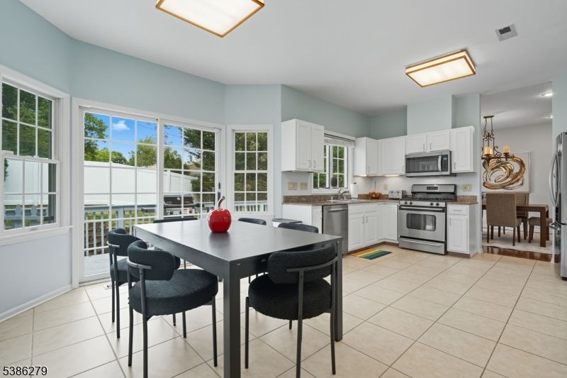 Chandelier, Dining room, Interior, Kitchen, Recessed Lighting, Stainless Steel Appliances