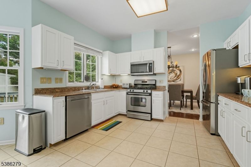 Chandelier, Dining room, Interior, Kitchen, Recessed Lighting, Stainless Steel Appliances