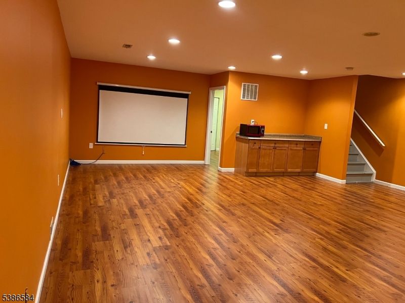 Empty room, Interior, Projection Screen, Recessed Lighting, Wood Texture Flooring