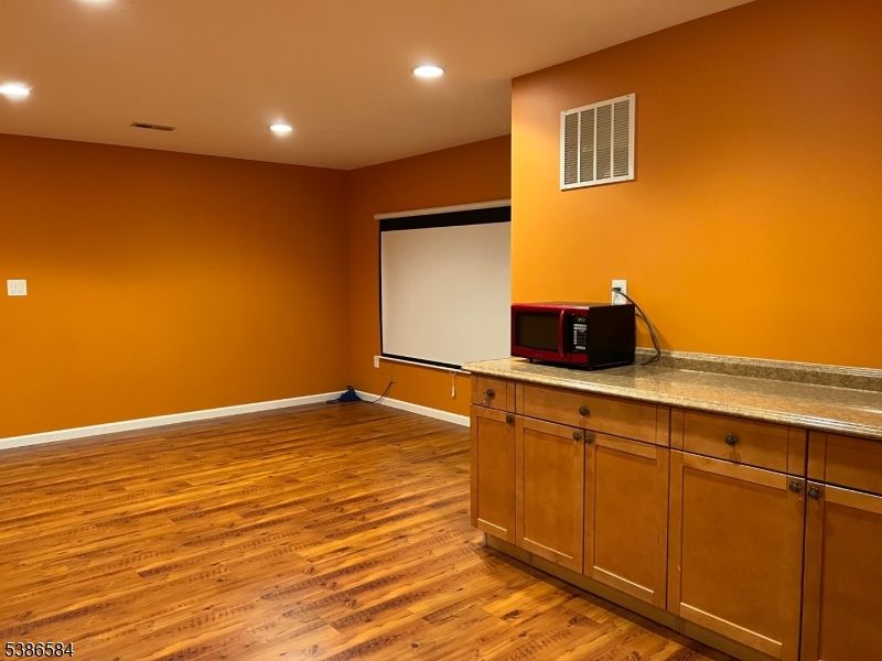 Empty room, Interior, Projection Screen, Recessed Lighting, Wood Texture Flooring