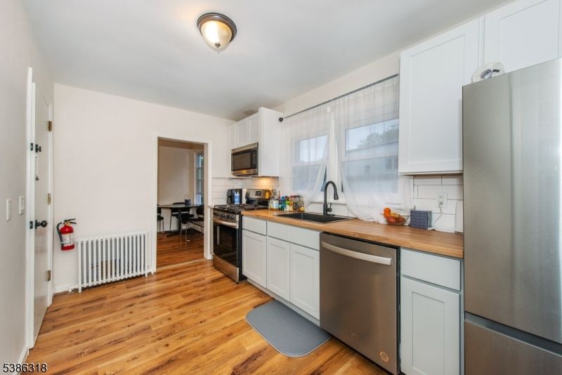 Interior, Kitchen, Stainless Steel Appliances, Wood Texture Flooring