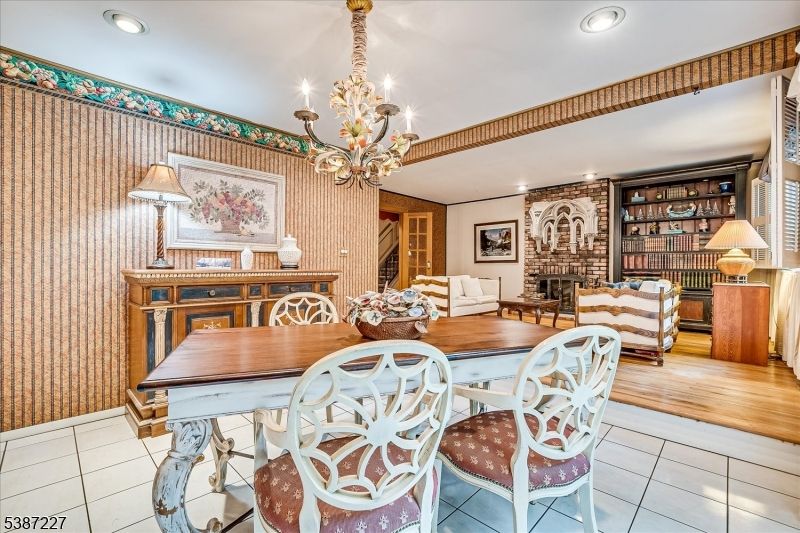 Chandelier, Dining room, Fireplace, Interior, Recessed Lighting, Wood Texture Flooring